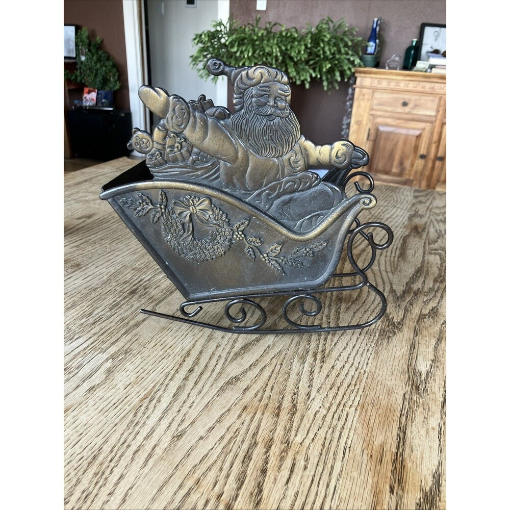 Mercuries U.S.A Hand crafted Bronzed Metal Santa and his Gift Sleigh 1993